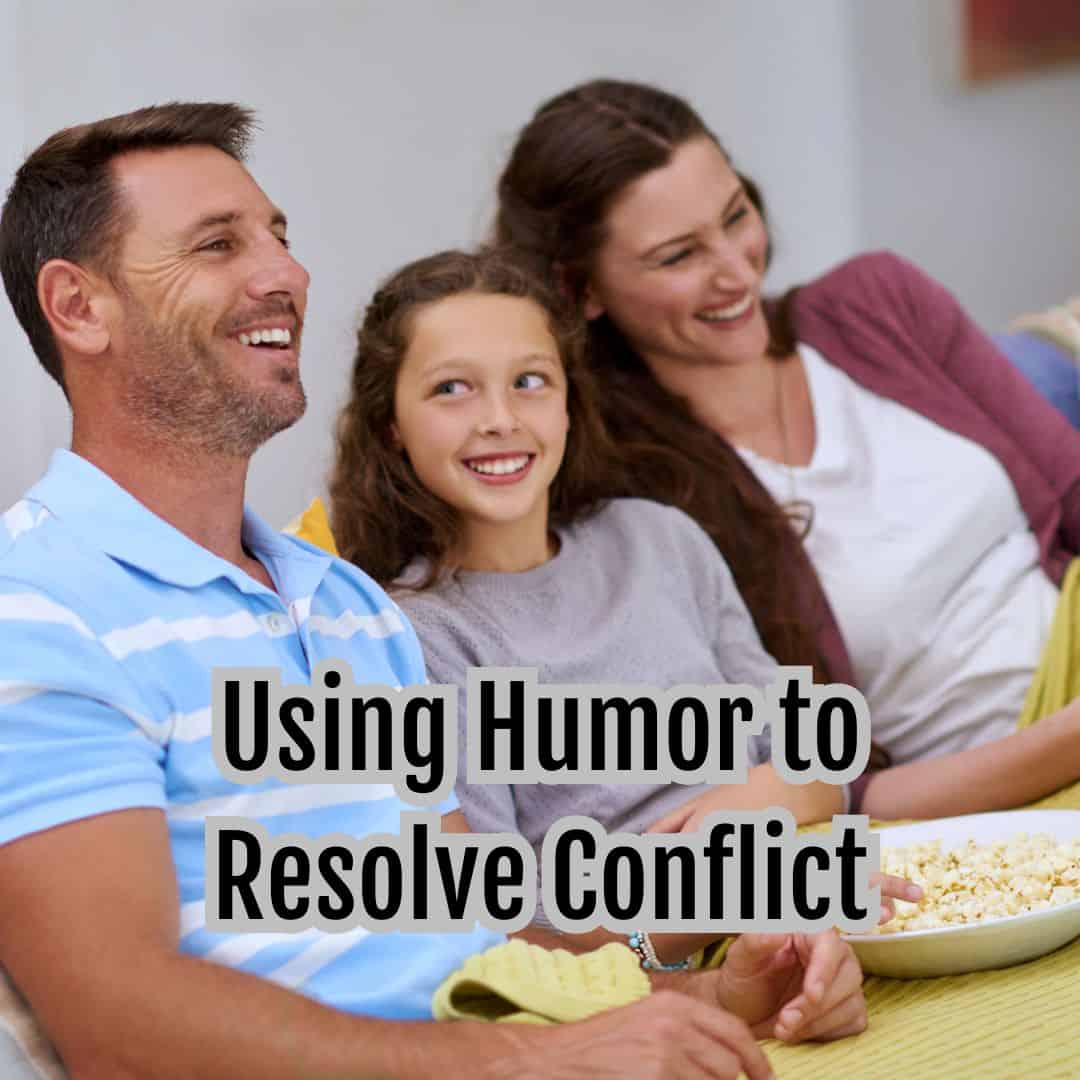 A smiling family—father, mother, and daughter—sits together on a couch with popcorn. Text on the image reads: "Using Humor to Resolve Conflict." Build emotional intimacy while turning tough moments into laughter.