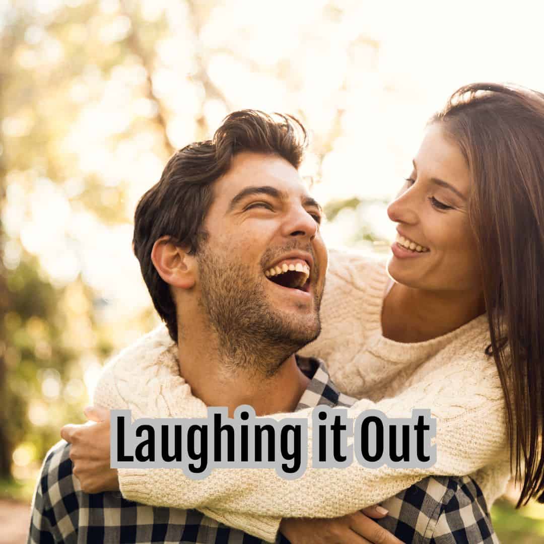A couple enjoying a moment outdoors, with the woman playfully leaning on the man's back. Both are smiling amidst a sunlit, blurry background of trees. The text "Laughing It Off" appears at the bottom, capturing their ability to find humor in family conflicts.